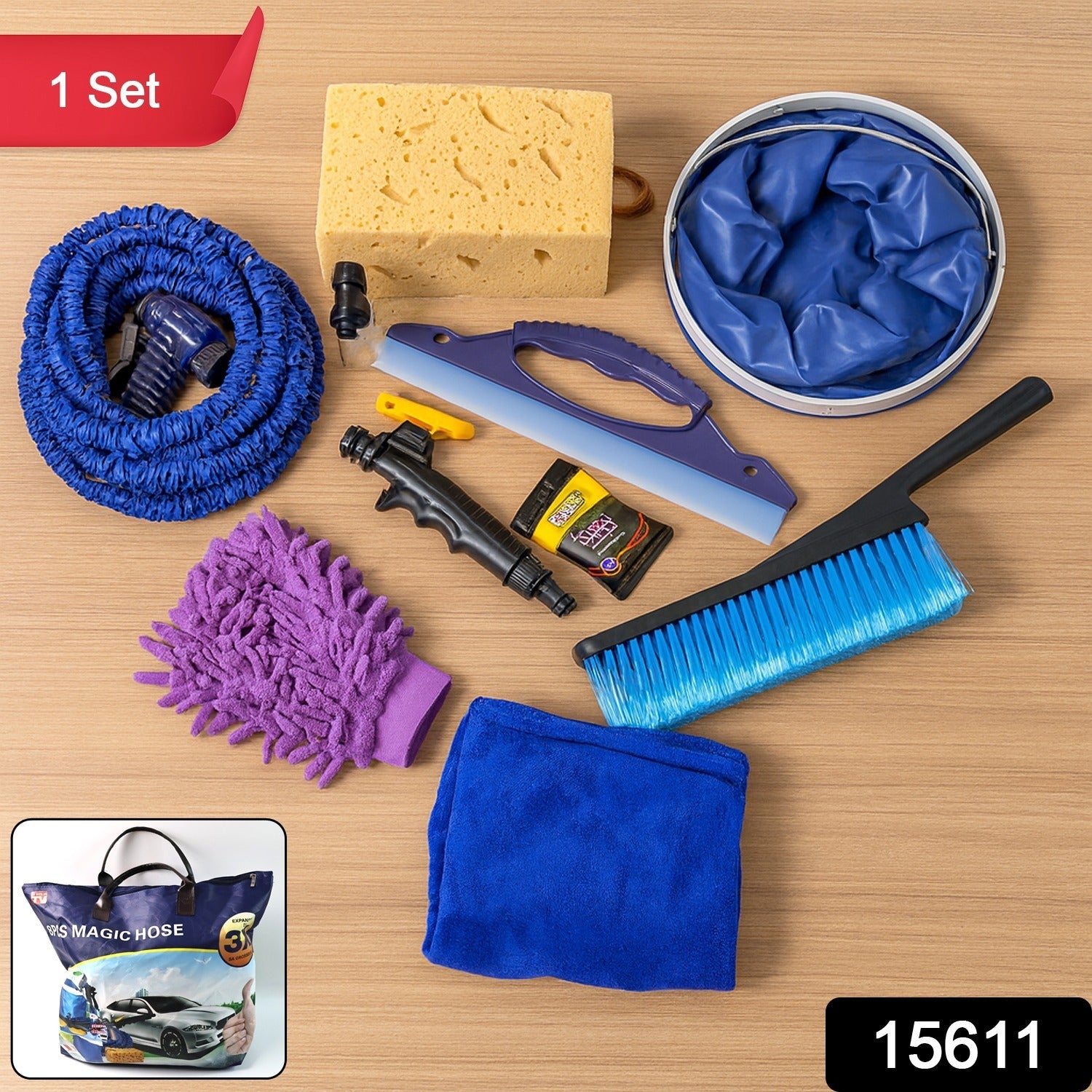 A car washing kit with a blue hose, purple mitt, yellow sponge, blue bucket, and various tools on a light wooden surface.