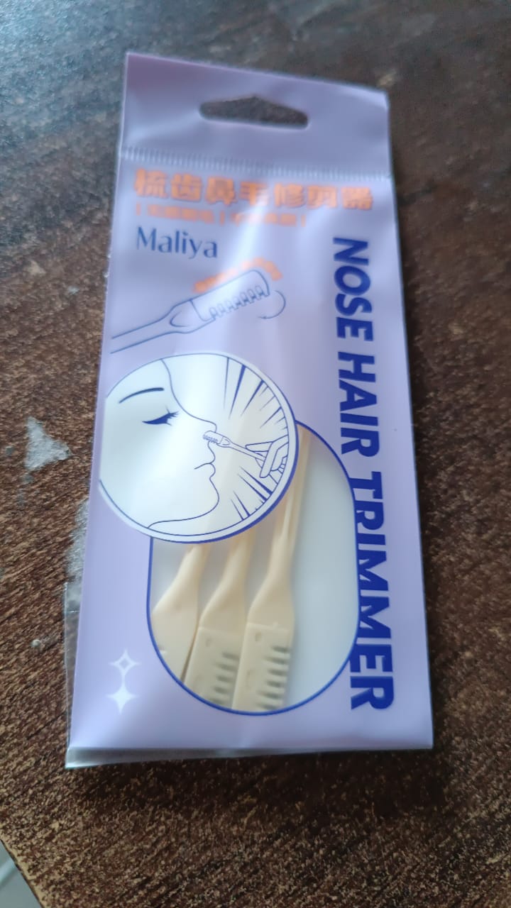 A clear plastic package containing three beige manual nose hair trimmers, labeled "Nose Hair Trimmer".