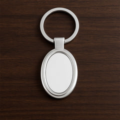 Sleek oval metal keychain showcasing durable build and chrome shine